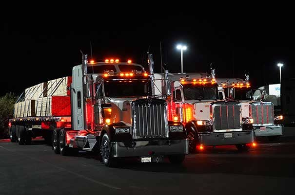 MT trucks at night